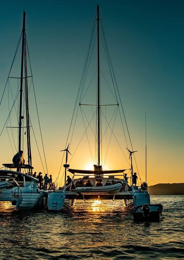 Sailboats at dusk