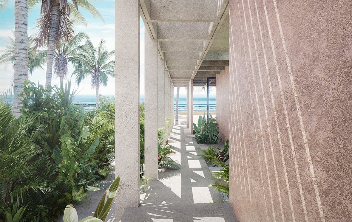 A colonnade opening onto the palms and the ocean